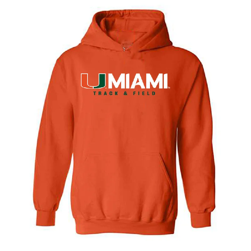 Miami - NCAA Women's Track & Field : Iyonna Codd - Classic Shersey Hooded Sweatshirt Hoodie with Hem Embroidery Detailed Premium Miami - NCAA Women's Track & Field : Iyonna Codd - Classic Shersey Hooded Sweatshirt Hoodie with Hem Embroidery Detailed Premium